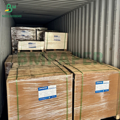 0.7 মিমি 590 গ্রাম ইলেকট্রনিক্স পণ্যের জন্য সাদা মুখের ক্রাফট বোর্ড প্যাকেজ 79 x 109 সেমি