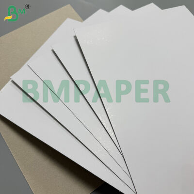দৃঢ় প্যাকেজিংয়ের জন্য ৩০০ গ্রাম সাদা ফ্রন্ট গ্রে ব্যাক ডুপ্লেক্স বোর্ড ৭০ সেমি ১১৫ সেমি ১২০ সেমি রোল